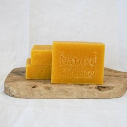 Natural vegan soap bars made with mango and tangerine, available in 90g and 45g sizes.