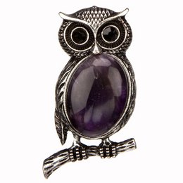  Pendant/brooch owl with amethyst, 50x26mm. Oval-shaped amethyst stone set in a silver-toned metal owl pendant/brooch with intricate detailing.