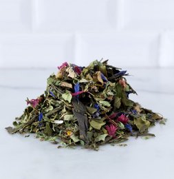 Minty Moringa tea is a blend of dried moringa leaves, mint, and other natural ingredients. The tea has a vibrant green color and a refreshing, minty aroma. It is packaged in a resealable foil pouch to preserve freshness.