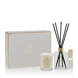  A reed diffuser set with a lily and green tea scent, featuring a glass bottle, reed sticks, and a decorative box.