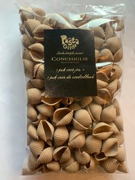  "Shell-shaped pasta, beige tan color, regenerative packaging, gift box presentation"