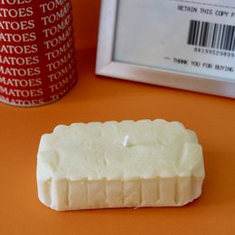  Rectangular white candle with a salted butter scent, suitable for pillar candle use.