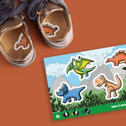 Colorful dinosaur-themed shoe stickers featuring various dinosaur shapes and designs, suitable for decorating children's shoes.