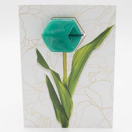  Greeting card with a jade-colored hexagonal cube and green leaves on a textured background.