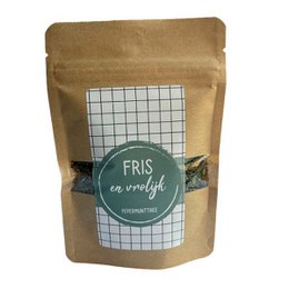  Fresh mint tea in a brown paper bag with a green label that says "FRIS de vreugde" and a grid pattern.