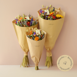  Dried flower bouquet in various sizes, featuring a vibrant mix of orange, yellow, and multicolored dried flowers arranged in paper cones.