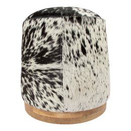  A round, black and white cowhide-patterned pouf ottoman measuring 40x40x43cm.