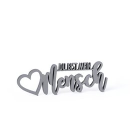 A silver-colored decorative plaque with the German text "Du bist mein Mensch" (You are my person) and a heart shape.
