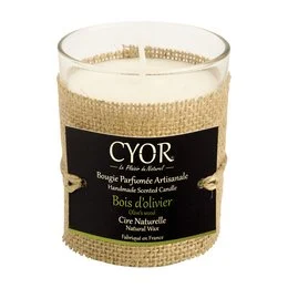 Natural olive wood candle with a rustic, earthy aesthetic. The candle is scented and features a burlap wrap around the glass container.