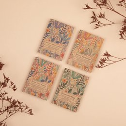 A card to plant with a basil seed packet, featuring a colorful floral design and the text "Happy Father's Day".