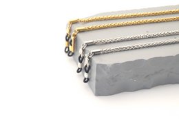 Stylish glasses chain in silver and gold colors, made of durable materials for secure eyewear hold.