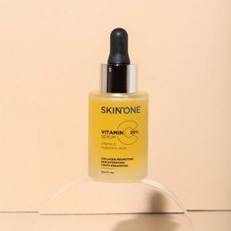  Vitamin C face serum with orange slices. Brightening, hydrating, and antioxidant-rich formula for glowing skin.