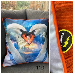  Decorative cushion cover featuring a pair of swans in a serene, watercolor-style design. The cushion cover is made of a soft, plush material and would make a beautiful addition to any living space.