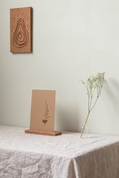 Rectangular cork cardholder with minimalist teardrop design, suitable for holding cards or small items.