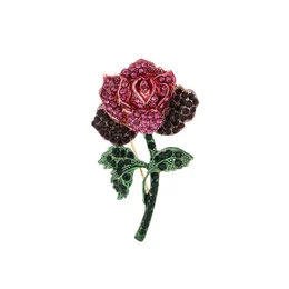 Fuchsia rose brooch with burgundy and dark purple flowers, green stem leaves, beaded crystal embellished design.