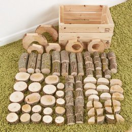 A 90-piece wooden construction set with various shapes and sizes of wooden blocks, logs, and discs in natural wood tones, suitable for educational and creative play.
