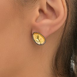 Gold-plated brass stud earrings with oval-shaped limpet shell design