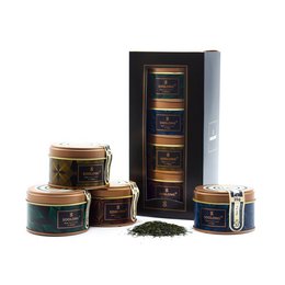 A set of Japanese tea tins in various sizes and shapes, featuring traditional Japanese designs and imagery. The tins appear to be high-quality and likely contain premium tea products.