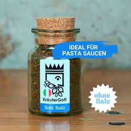 Herbal seasoning blend in a glass jar, ideal for pasta sauces. Contains a variety of herbs and spices for flavoring Italian-style dishes.