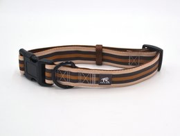 Adjustable dog collar with golden shimmer accents, suitable for pets.