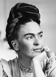 Frida Kahlo portrait postcard with colorful Mexican-inspired border design.