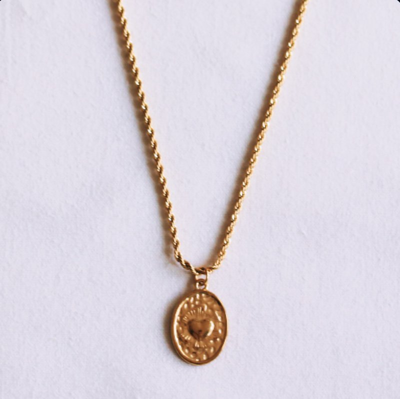 Twisted steel chain with an oval heart charm