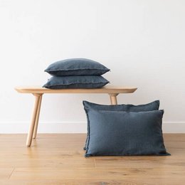 Linen cushion cover in blue terra color with fringe trim. Available in various sizes including 30x40 cm, 30x50 cm, 40x60 cm, and more. Suitable for living room, bedroom, or outdoor use.