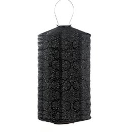 Black solar-powered outdoor lantern with a cylindrical shape and a decorative star pattern design. Made of weather-resistant materials for use in gardens, patios, or other outdoor spaces.