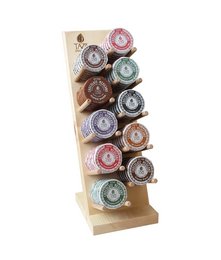 A wooden display stand for 60 Mexicano discs, featuring a variety of colorful discs arranged in a vertical layout.