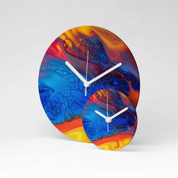  A round, multicolored wall clock with an abstract, vibrant design. The clock features a diameter of 13cm and is made of MDF material.