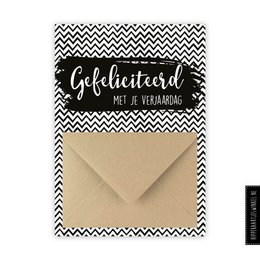 A black and white chevron patterned birthday card with the German text "Geburtstagskarte" (Birthday Card) printed on it. The card comes with a beige envelope.