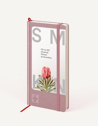 Slim, regular-sized universal planner notebook in smoke, mustard, or rose colors with a floral design on the cover.