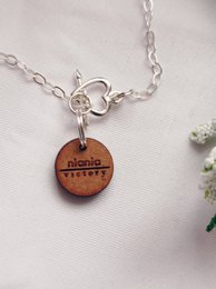 Bracciale in argento sterling con cuore occhio di tigre