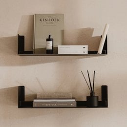 Modern industrial wall shelves in black, beige, and white colors. Available in 3 sizes: small (37 cm), medium (60 cm), and large (97 cm). Designed for contemporary home decor.