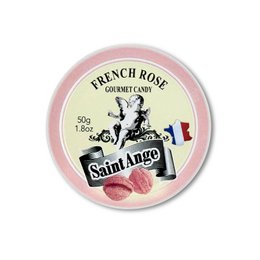 Pink rose-flavored bonbons in a round tin container with a vintage-style label featuring a rose graphic.