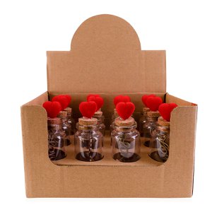 Bottle mail with heart decoration and note for message