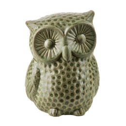  A ceramic owl-shaped piggy bank with a textured, dotted pattern in shades of green.