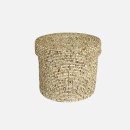  Tall, round storage box made of woven beads in a sand-colored design, suitable for storing various items.