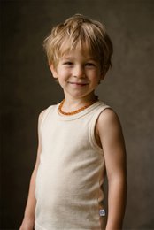  Natural merino wool sleeveless tank top for kids, cream colored, soft material, comfortable fit.