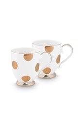  A set of 2 small mugs with a white and gold polka dot design, suitable for tea or coffee.