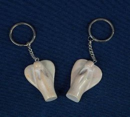 Natural soapstone angel-shaped keychain with a simple, minimalist design.