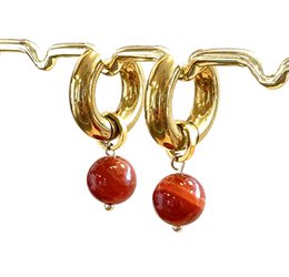  Gold-toned hoop earrings with warm orange agate stones.