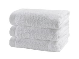 White, soft, and absorbent bath towel.