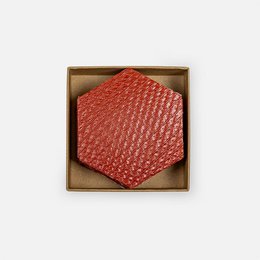  Hexagon-shaped coasters made from fire hose material, available in NASTY BLUE, BLACK, and RED colors. The coasters have a textured, woven pattern that provides a unique and durable surface for placing hot or cold beverages.
