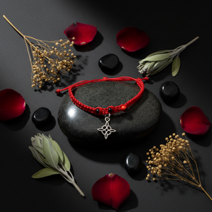 Red protection bracelet with witch's knots & semillas de huaruro - hand-woven from Peru