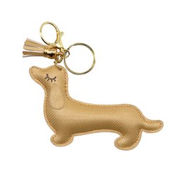  Gold glitter dachshund keychain with metal ring and tassel.