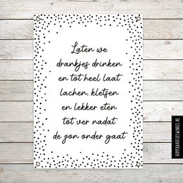 Large black and white garden poster with polka dot border and Dutch text. The poster features a motivational message about enjoying the moment and living life to the fullest.