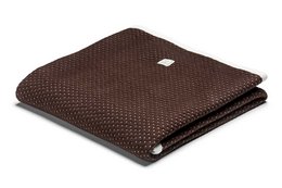 Soft, brown baby blanket with polka dot pattern. Suitable for use in a crib or stroller.