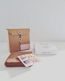 Edible flower seed kit with instructions and growing supplies in a decorative box.