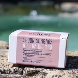 Organic cold-pressed soap bar with natural ingredients and packaging made from sustainable materials.